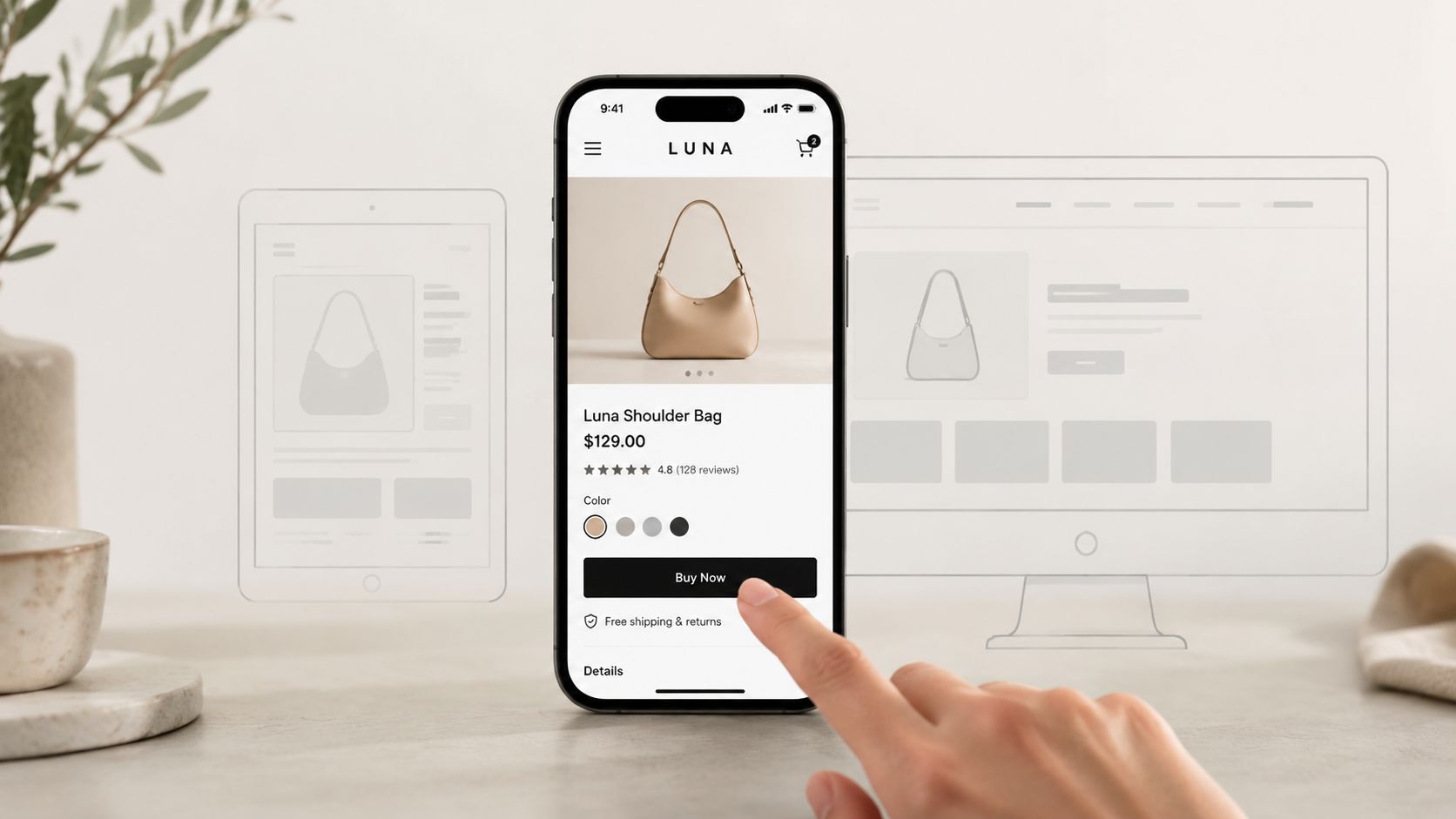A hand touching a mobile phone screen displaying a product page for a Luna shoulder bag.